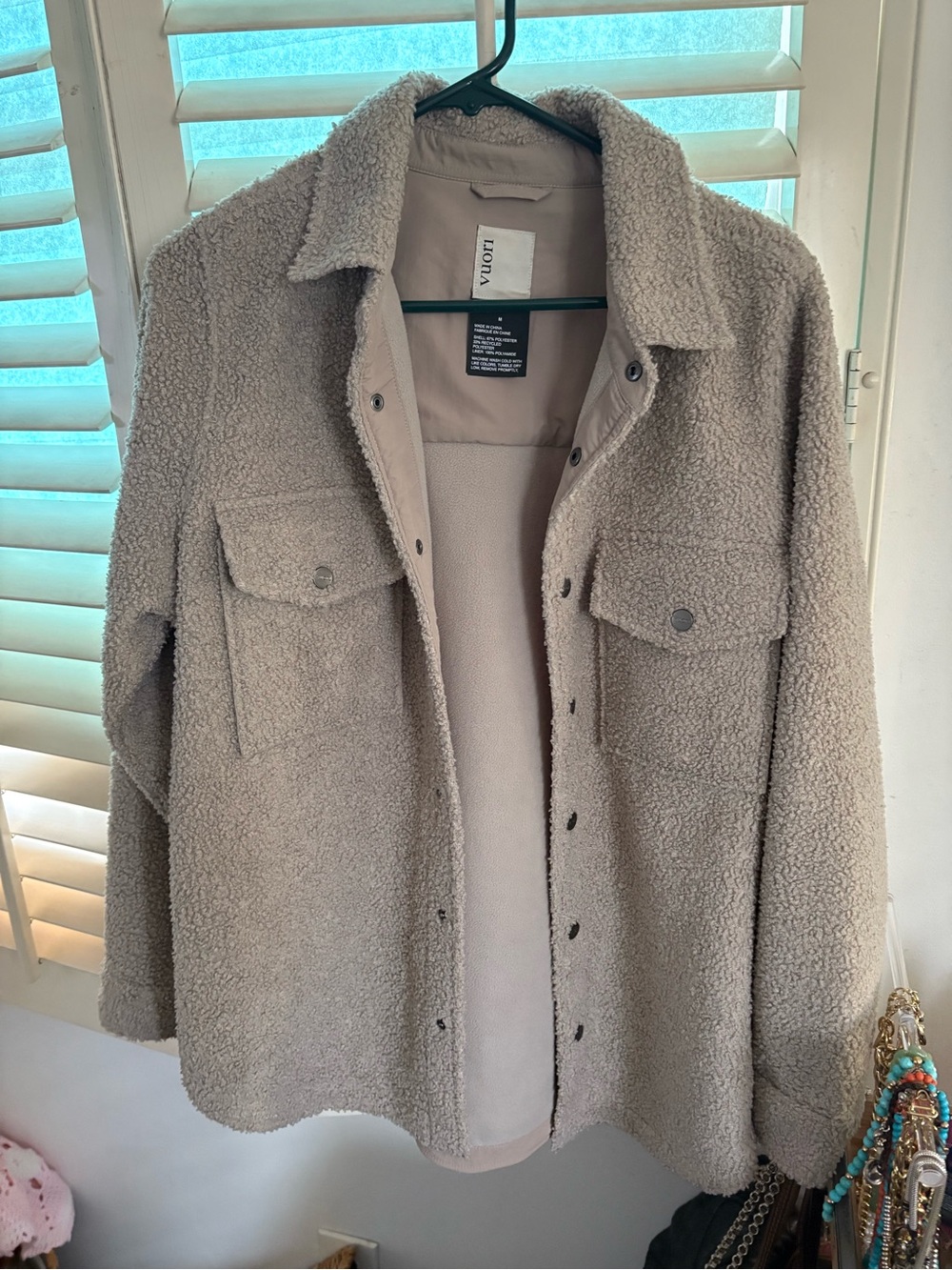 Vuori women's Taupe Jacket with White Brand Label